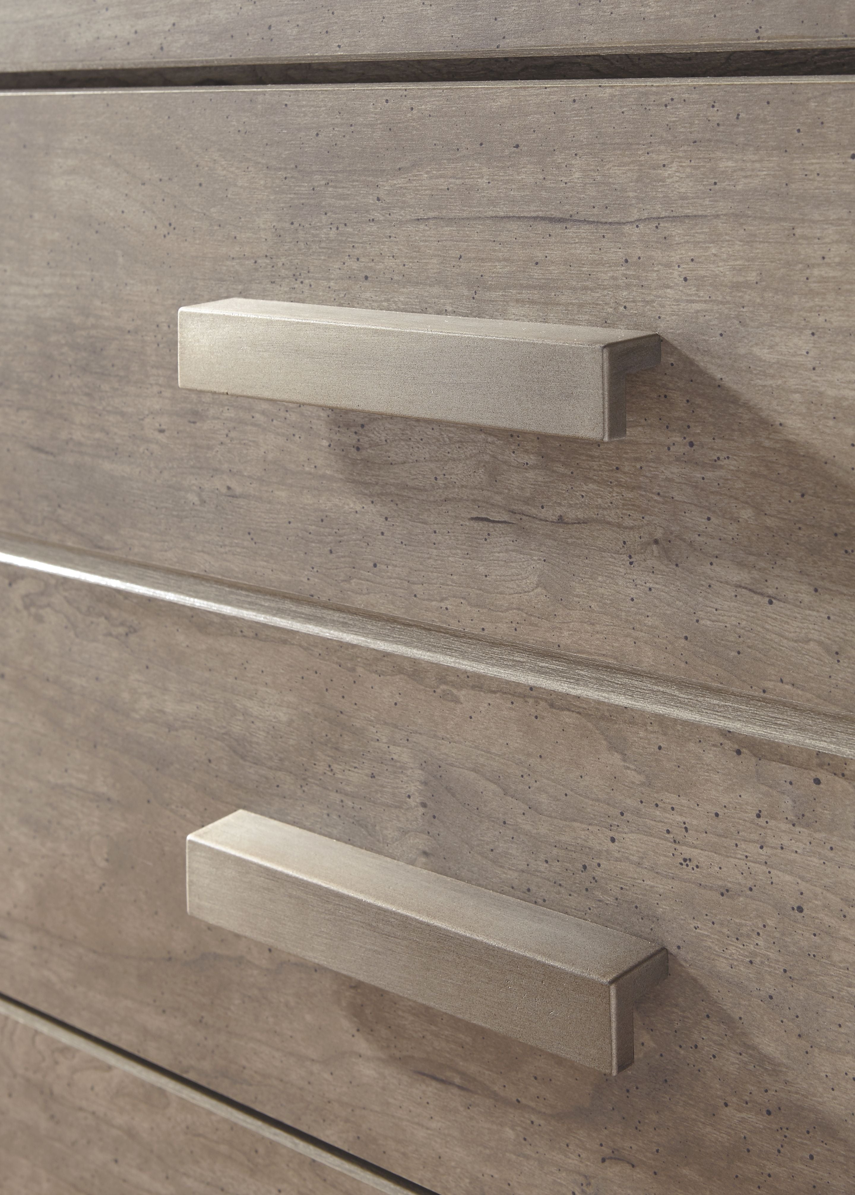 Gray night stand drawer with long bar pull and subtle woodgrain texture