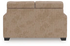 Light brown upholstered loveseat back and seat with wide arm panels