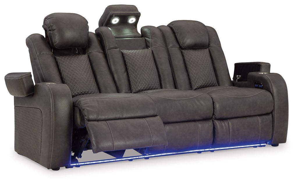 Power reclining sofa with adjustable headrests, dark brown leather-look upholstery