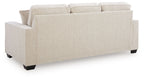 Larimer sofa in beige upholstery with thick arms, rounded back, and three seat cushions