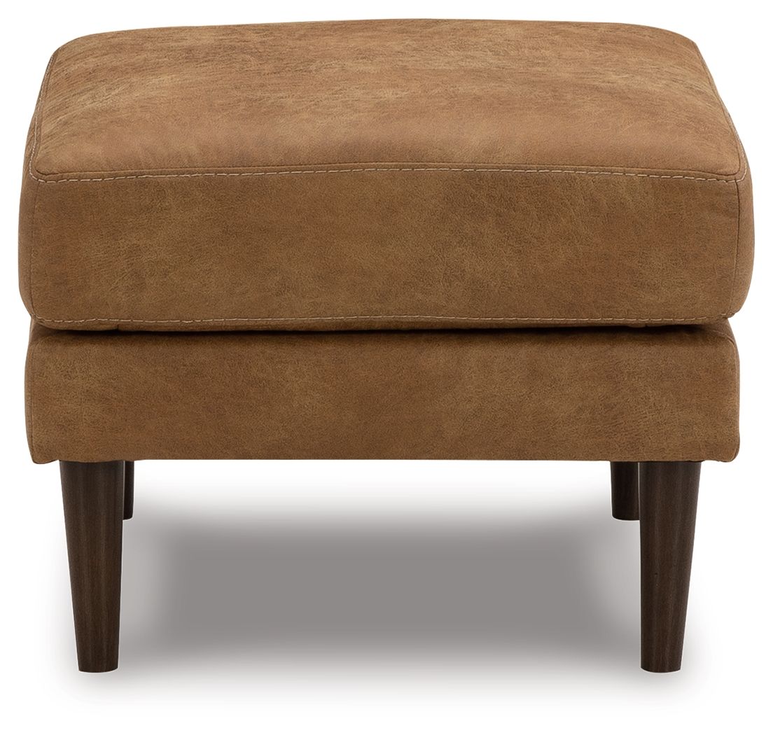Caramel ottoman with rounded arms, stitched seam, and dark wooden legs