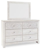 Whitewash dresser with matching mirror and ornate drawer pulls, six-drawer