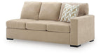 Almond upholstered sofa sleeper with three seat cushions and square armrests