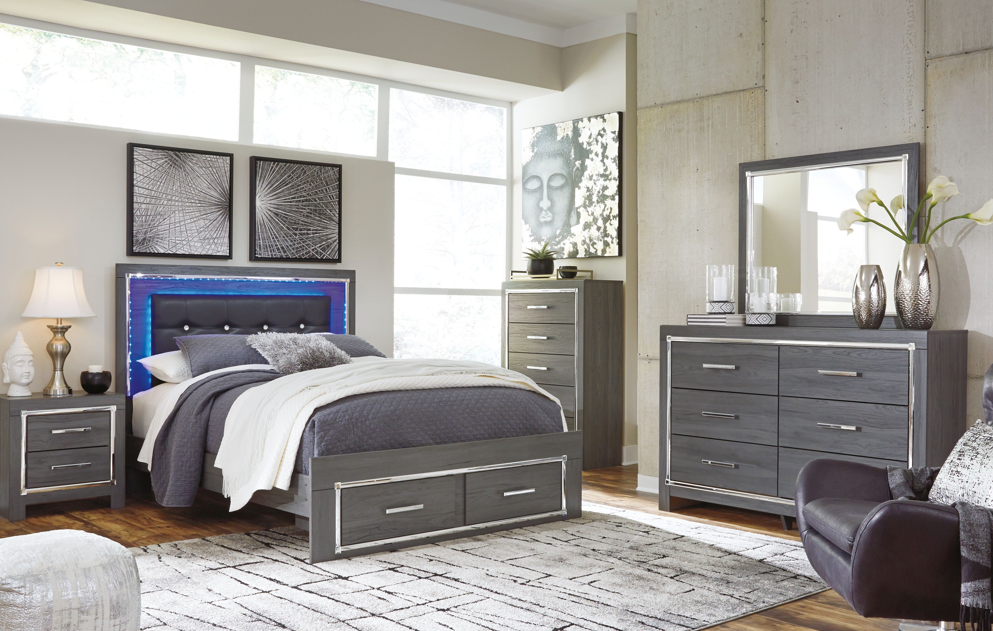 Gray storage bed with drawer base in a matching bedroom set