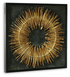 Square framed black wall art with gold metal ring-and-spoke sunburst