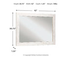 Rectangular bedroom accent mirror with whitewash wood frame and beveled edge