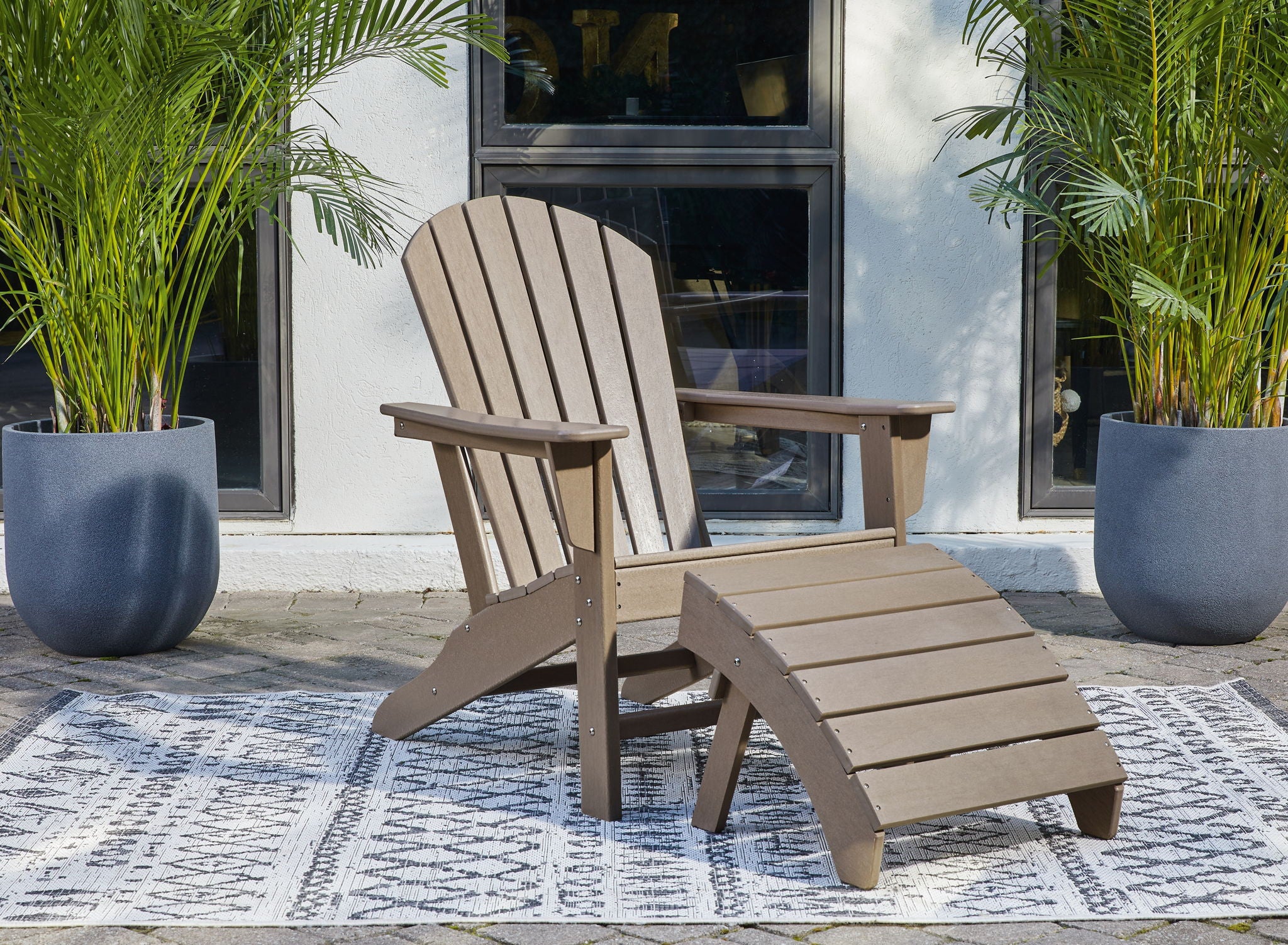 Driftwood Adirondack chair and matching ottoman with slatted seats