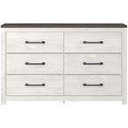 White panel dresser with four drawer fronts and dark bar pulls