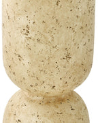 Beige speckled vase close-up, flared top and rounded pedestal