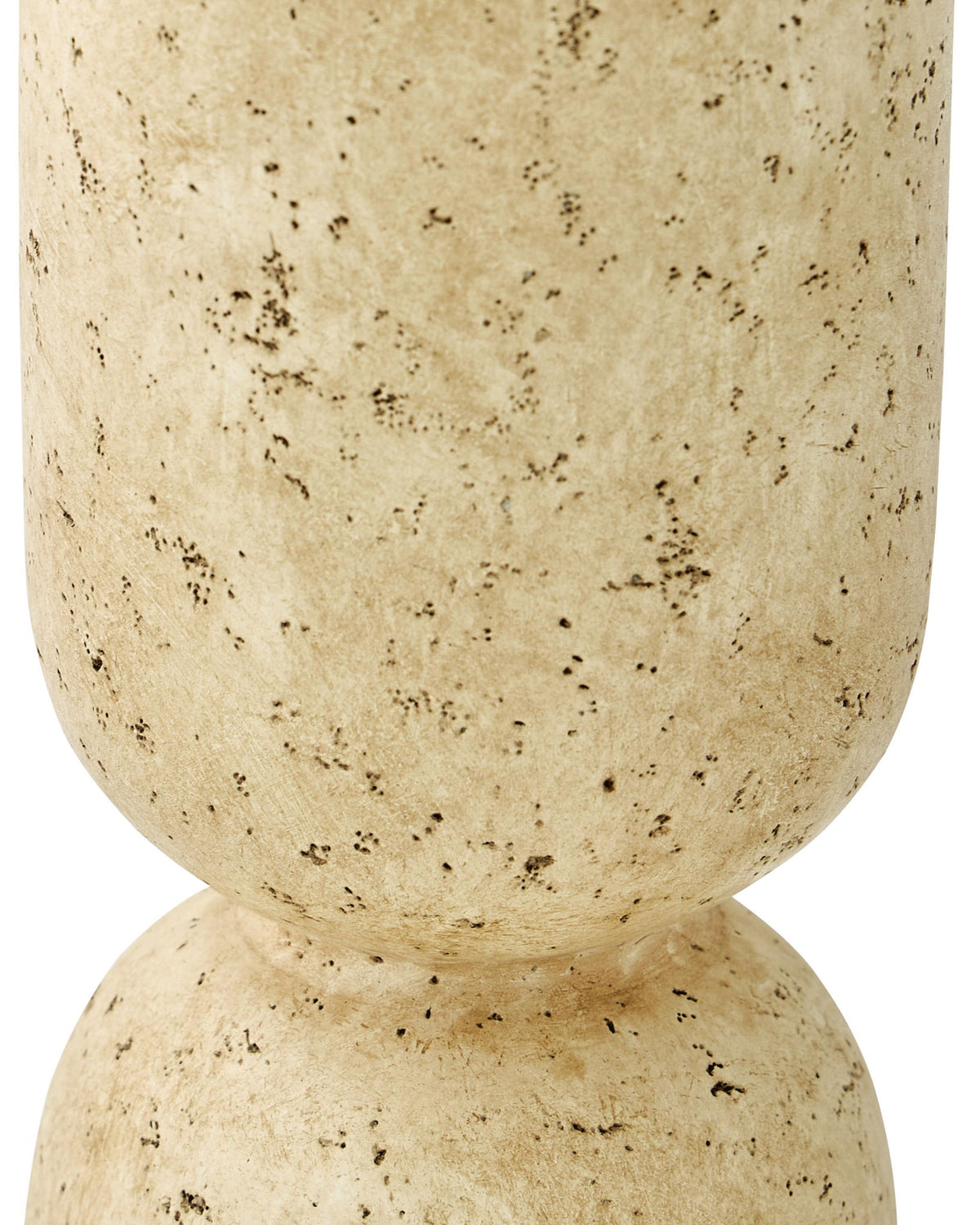 Beige speckled vase close-up, flared top and rounded pedestal