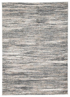 Beige rug with mottled light-and-dark striped pattern