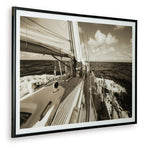 Sepia sailboat wall art print in dark frame, deck planks, ropes, and waves