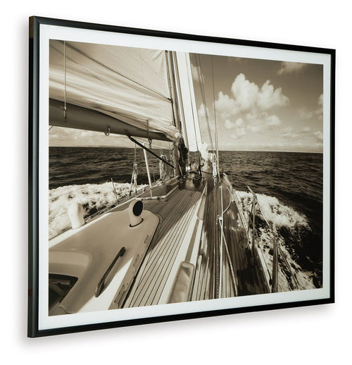 Sepia sailboat wall art print in dark frame, deck planks, ropes, and waves
