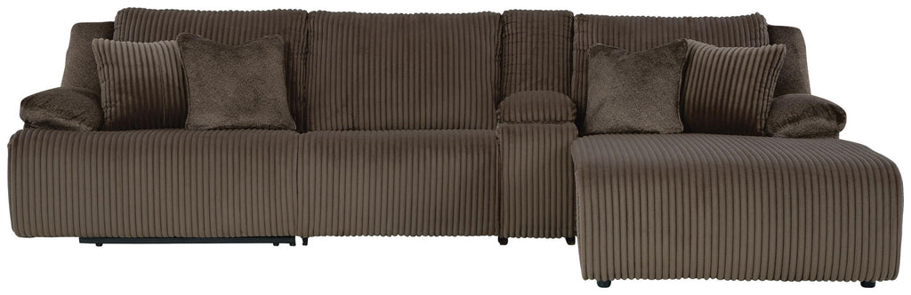 Dark brown reclining sectional sofa with striped upholstery, chaise seat, and layered pillows