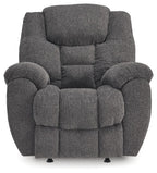 Charcoal fabric rocker recliner chair with padded back, seat cushions, and armrests