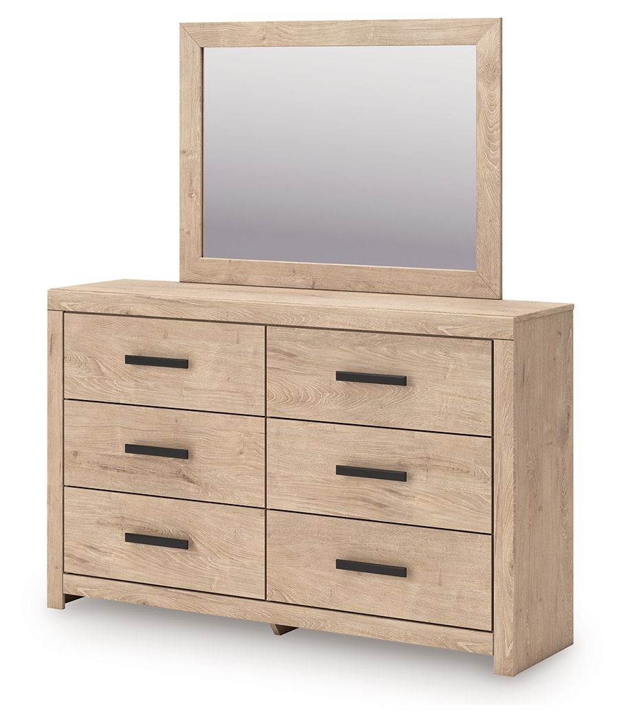 Tan dresser and mirror with six drawers, angled view, black bar handles