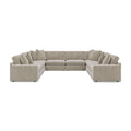 Beige 8-piece sectional sofa with tufted back cushions and rounded arm sections