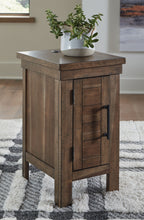 Gray-brown chair side end table with cabinet door, top hole, and side metal pulls