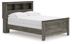 Gray bookcase panel bed with white mattress, open-shelf headboard, and squared posts.
