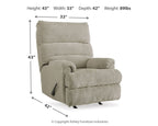 Upholstered rocking recliner chair with tall back, padded arms, and cushioned seat