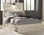 Beige panel bed with gray bedding and two front storage drawers, panel headboard