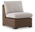 Armless chair with cushion in beige fabric and brown woven wicker base