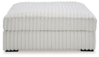 Oversized accent ottoman, light gray ribbed fabric with skirted side panels