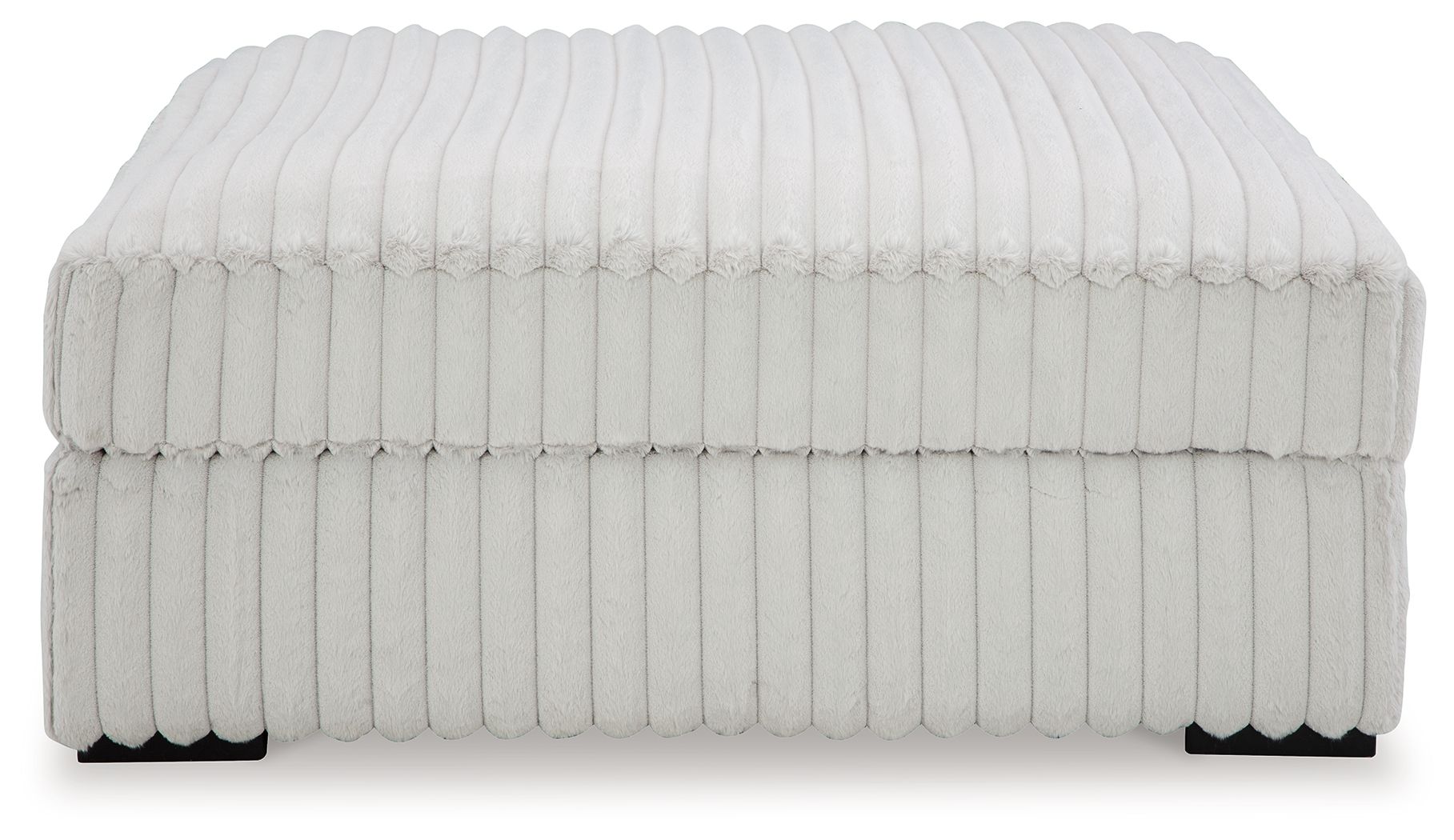 Oversized accent ottoman, light gray ribbed fabric with skirted side panels