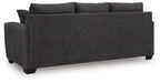 Dark gray upholstered sofa with three back cushions