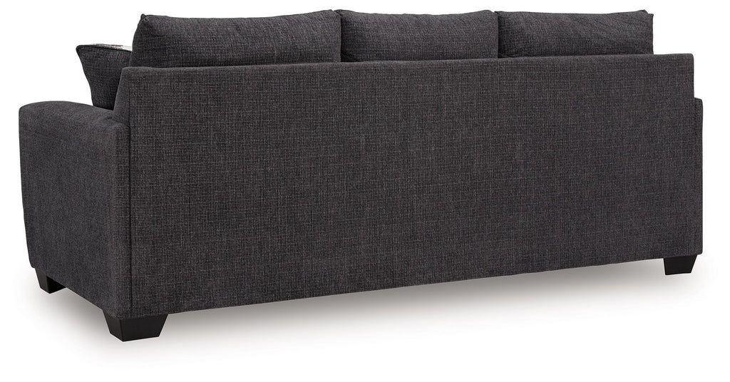Sofa sleeper, dark gray upholstery with three back cushions.