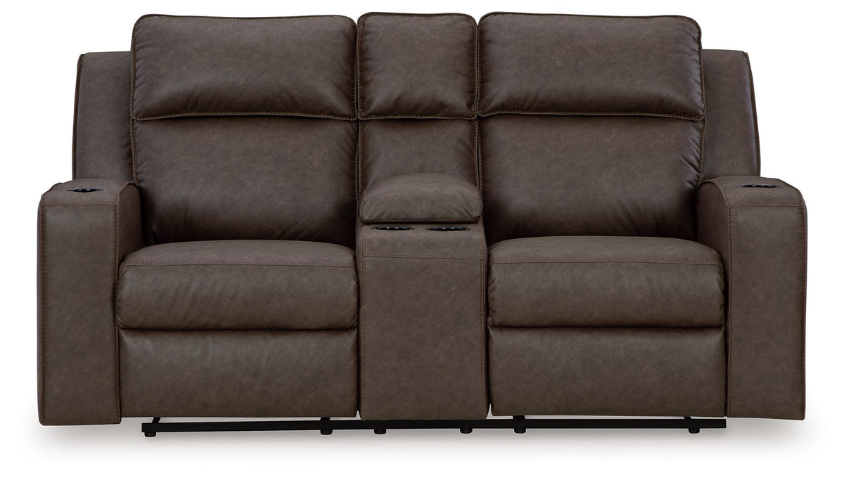 Double reclining loveseat with center console, dark brown upholstery, three back cushions