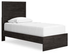 Panel bed frame in dark wood with slatted headboard and matching footboard
