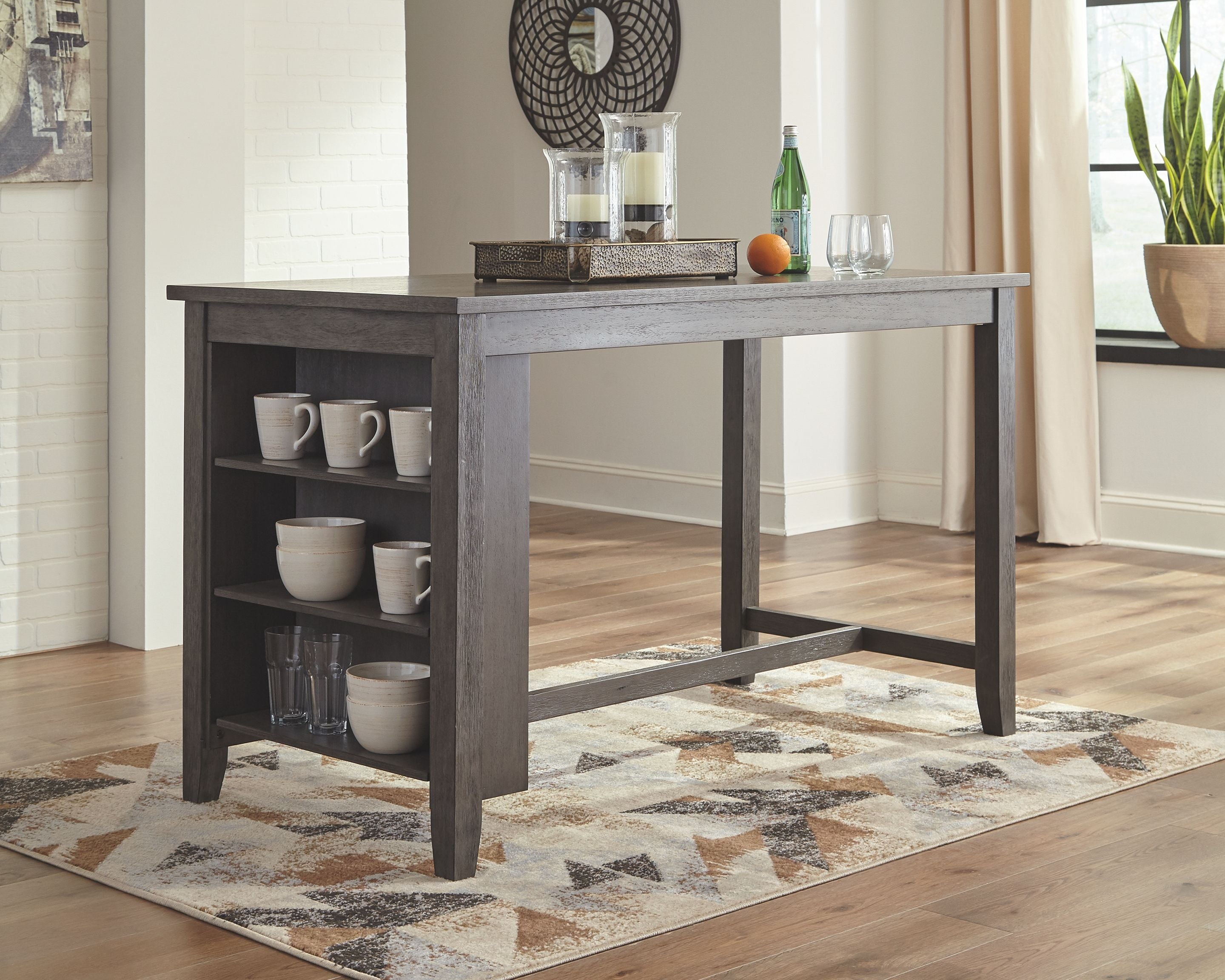 Gray rectangular counter table with open shelf storage and extended legs