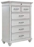 Whitewash dresser chest with six drawers and metal bar pulls, turned legs