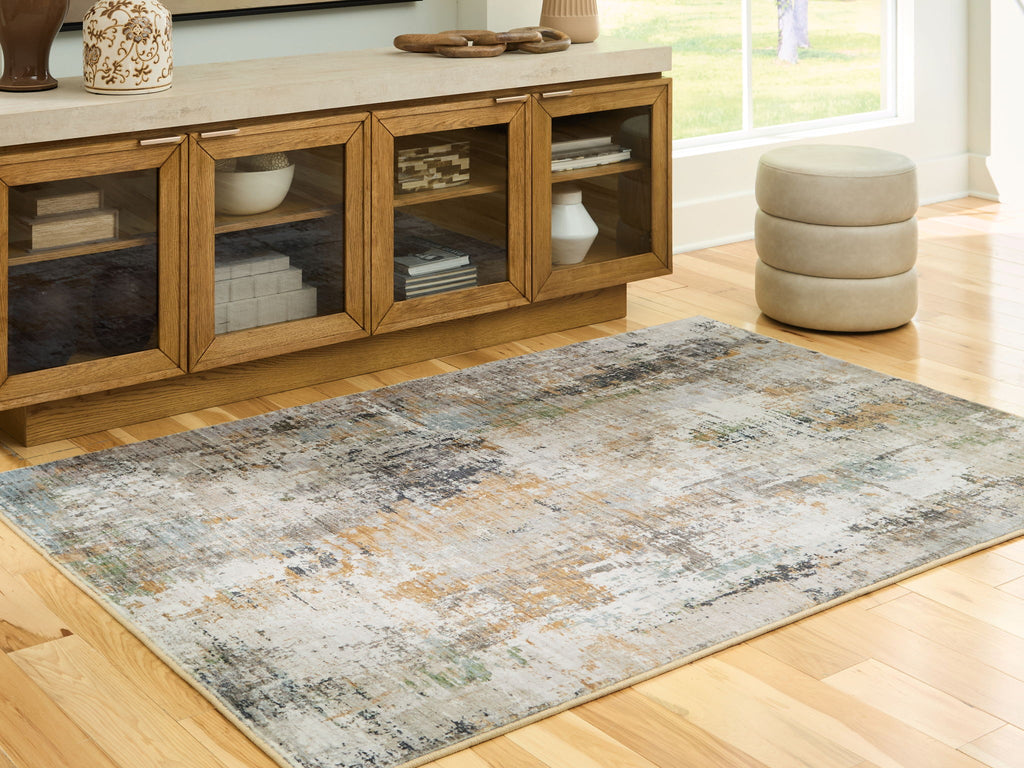 Abstract distressed area rug in light cream and muted blue-gray tones