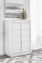 White five-drawer chest with lattice-pattern drawer fronts and wide toe-kick base