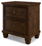 Brown two-drawer nightstand with two front drawers and round metal knobs, angled