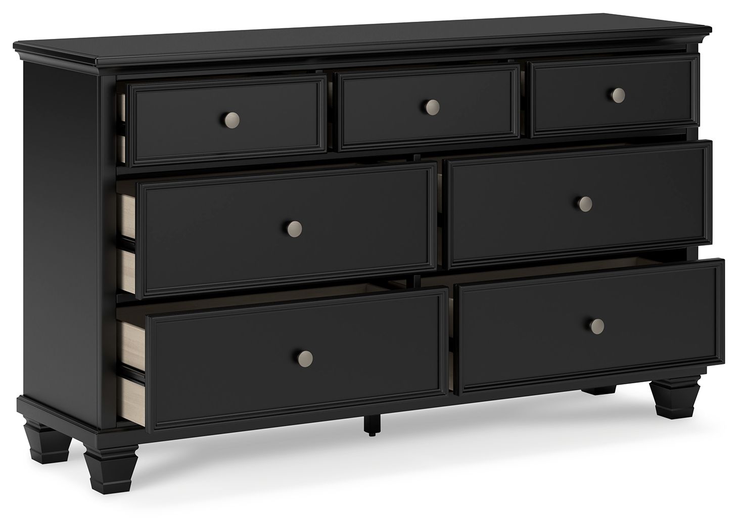 Black dresser with six drawers and round silver knobs, angled view showing side panel