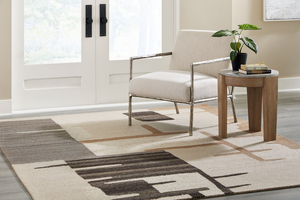 Abstract area rug with light beige base and dark brown geometric blocks