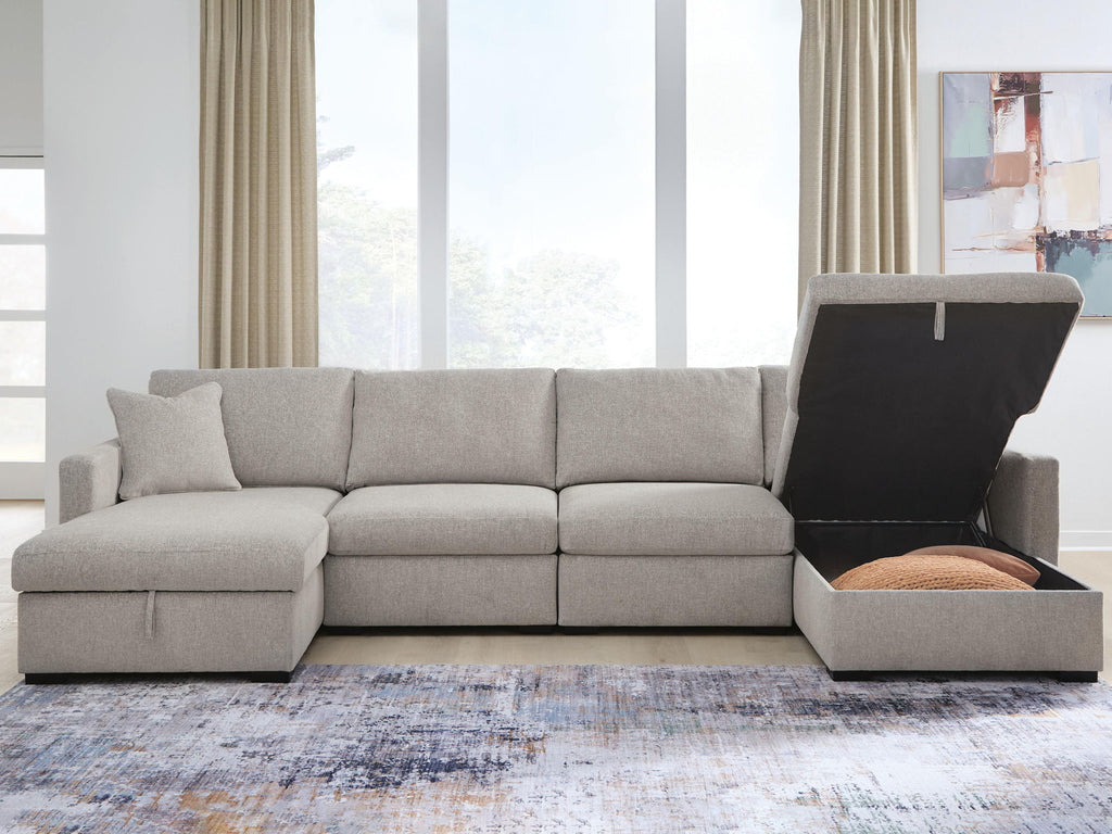 Gray sectional sofa with chaise arm and open storage compartment in the chaise base