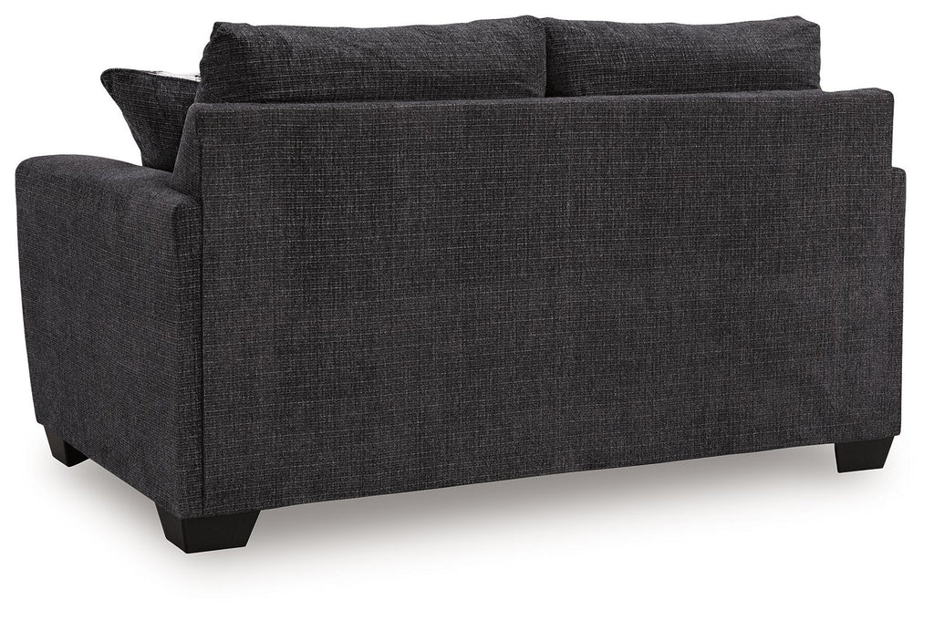 Dark gray loveseat with boxy arms and two back cushions, no throw pillows