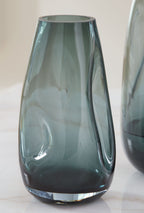 Light blue glass vase, tapered hourglass form with wide opening