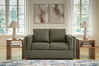 Olive green upholstered loveseat with two seat cushions and two back cushions