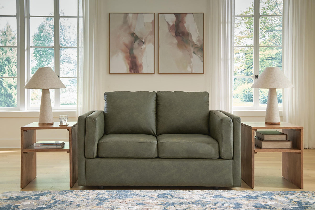 Olive green upholstered loveseat with two seat cushions and two back cushions