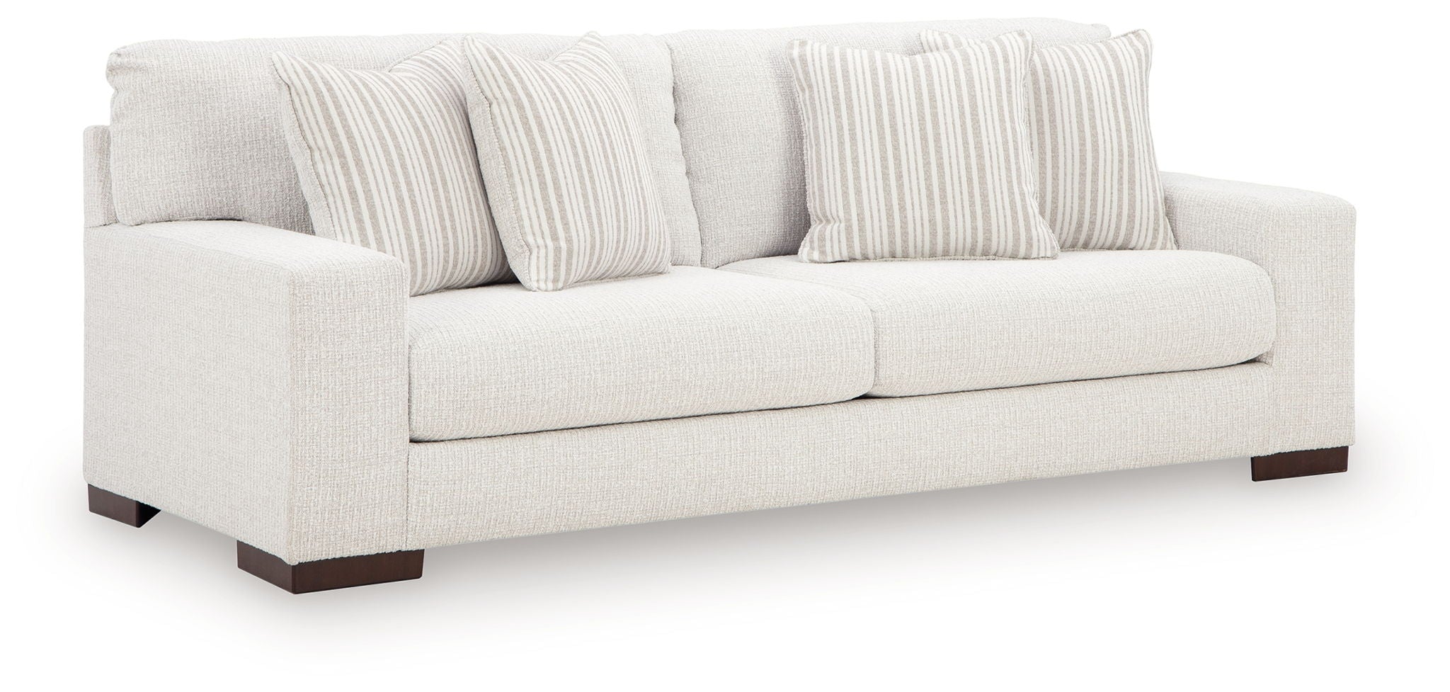 Hartside sofa with off-white fabric, striped throw pillows, two-seat design