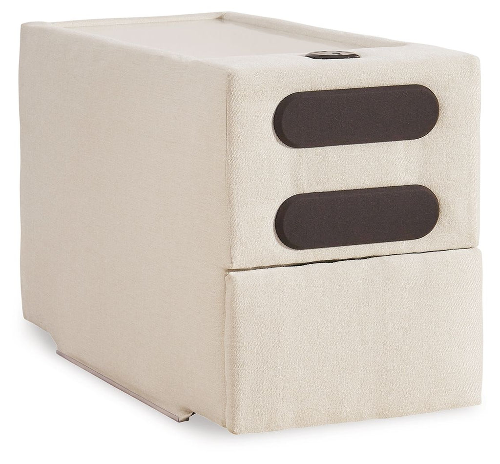 Oyster upholstered console with audio system; two dark oval speaker openings