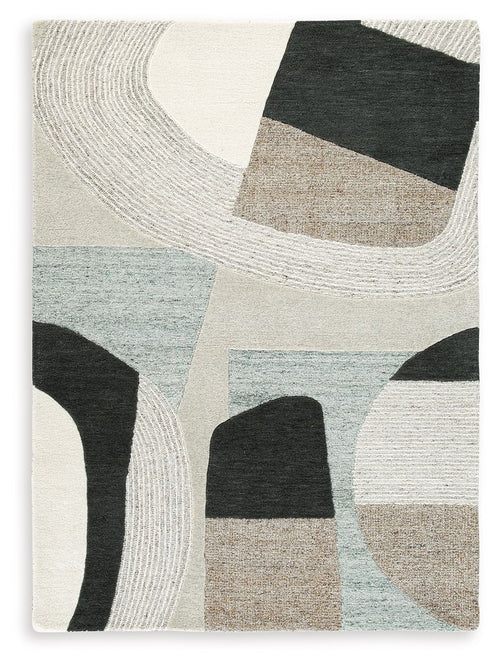 Beige abstract area rug with wavy concentric lines and dark gray, light blue, and tan blocks