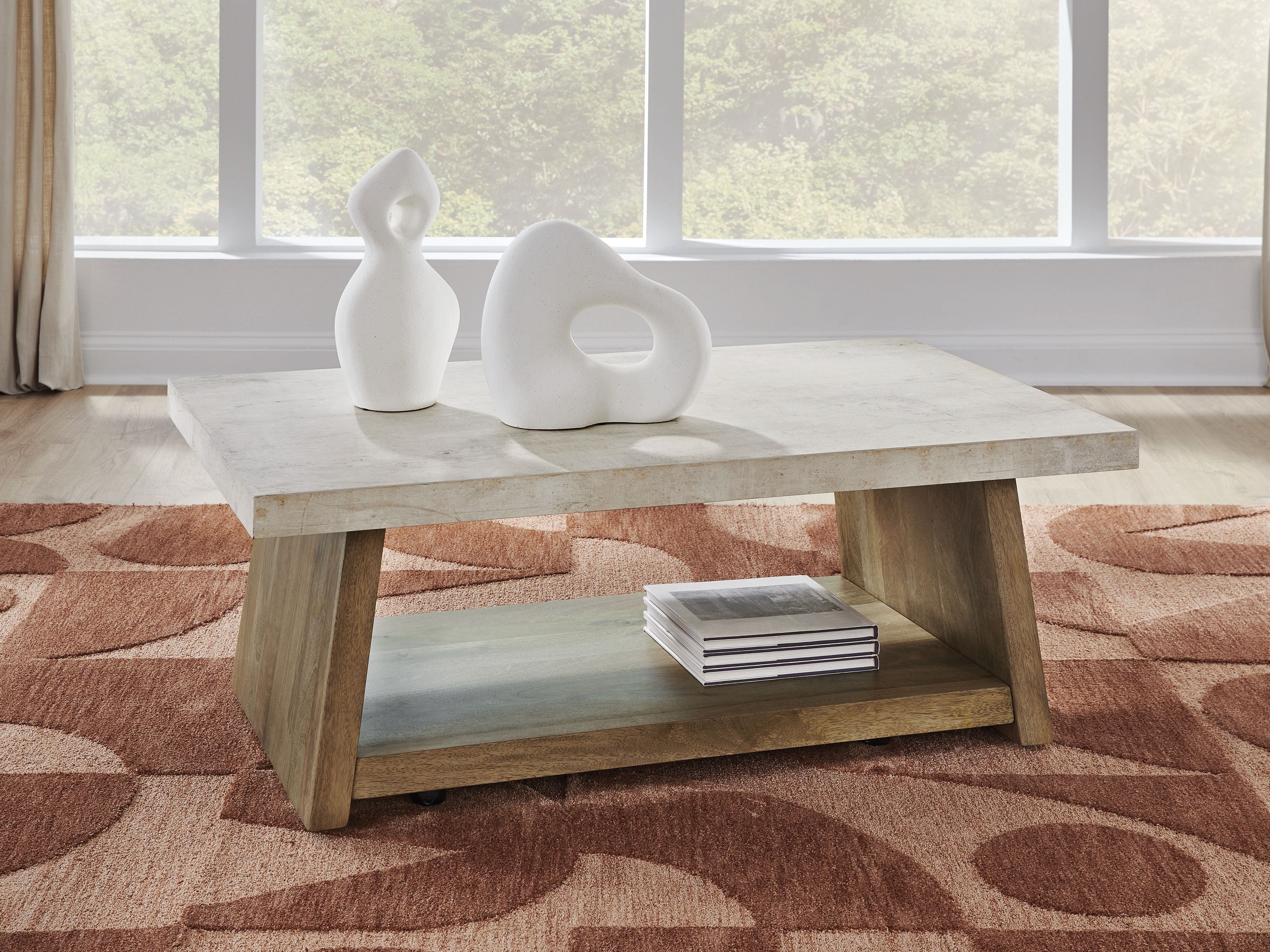 Rectangular table with concrete-look top and light brown lower shelf