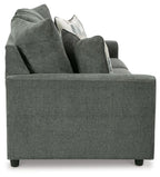 Stairatt sofa corner view with wide armrests, tufted back, and gray fabric upholstery