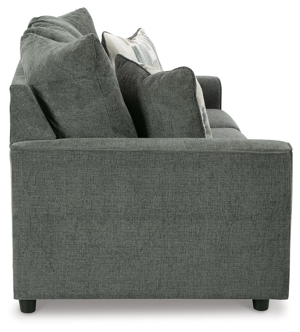 Stairatt sofa corner view with wide armrests, tufted back, and gray fabric upholstery